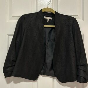 Black faux suede jacket, snake skin pattern.. cropped